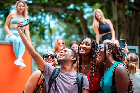 Group of students taking a selfie photo 